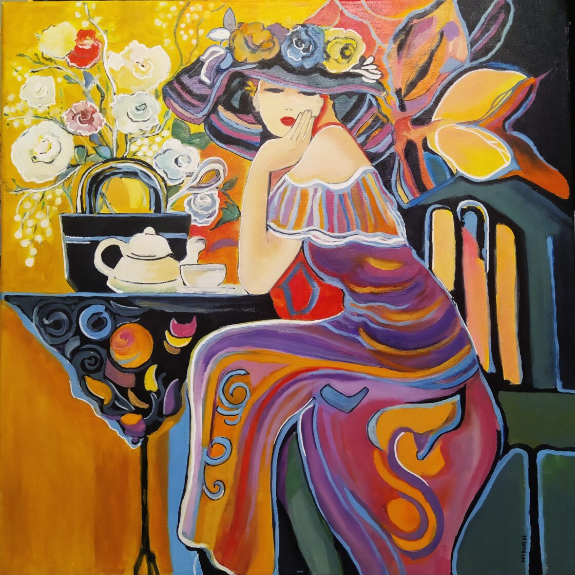 donna seduta al caffè